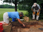 Barbara Heath and Daniel Brock excavating chimney feature facing northwest 6_12_14